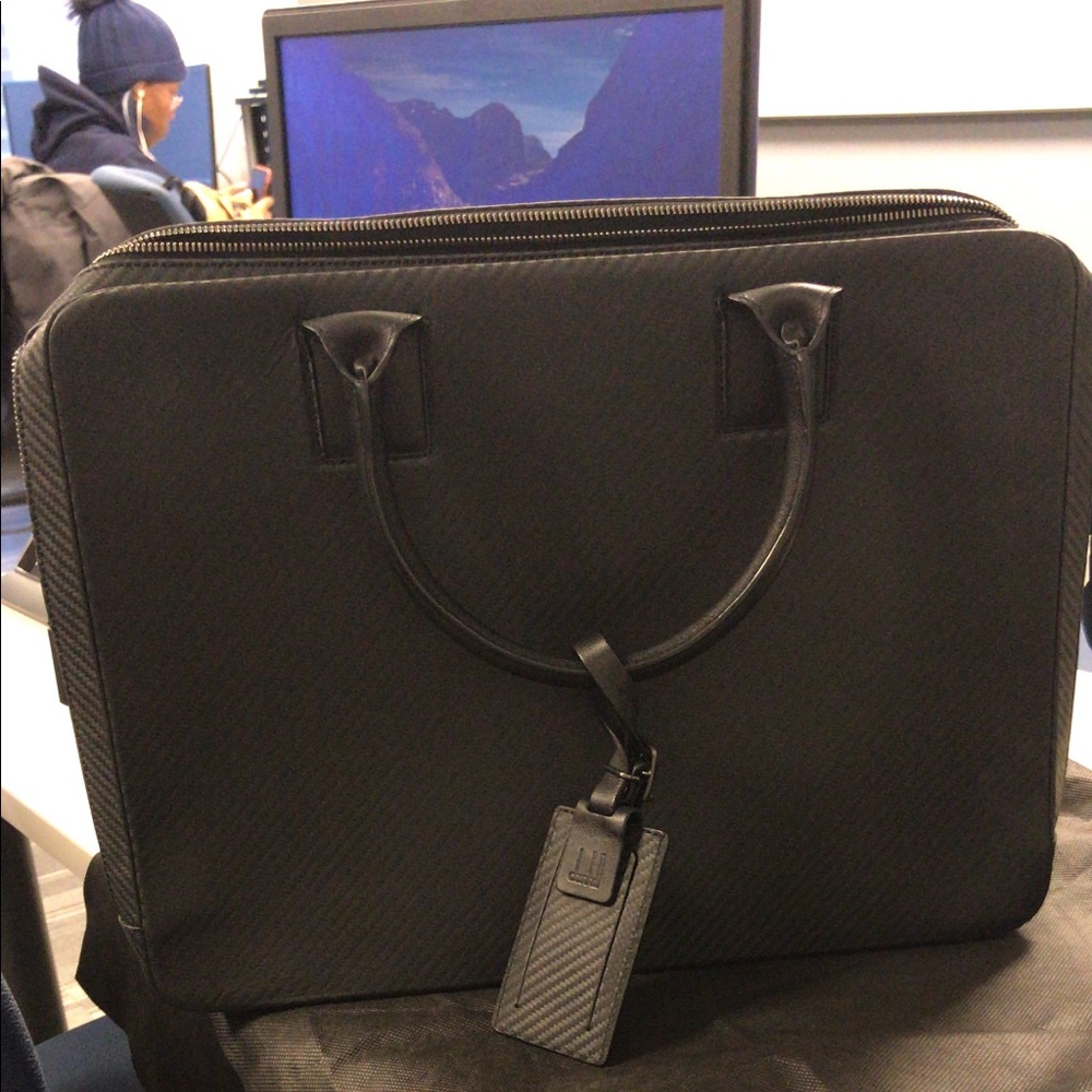 This item is a leather laptop/ briefcase.